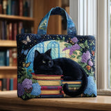 Handgefertigte Stepptasche – Schwarze Katze im Bücherstapel