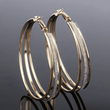 Große Glitzer-Creolen in Gold