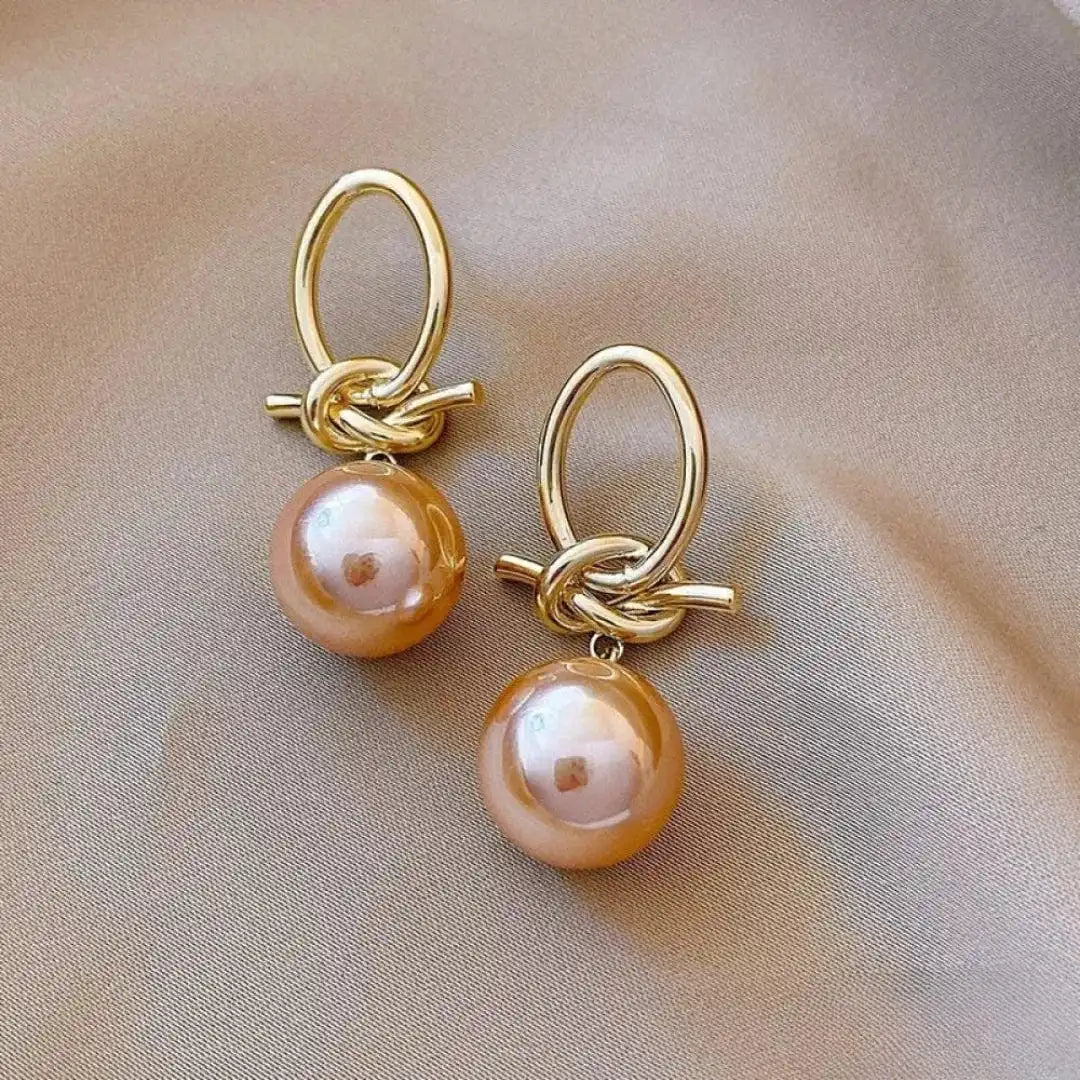 Ohrringe mit rosa Perle und Knoten, Ansicht 2