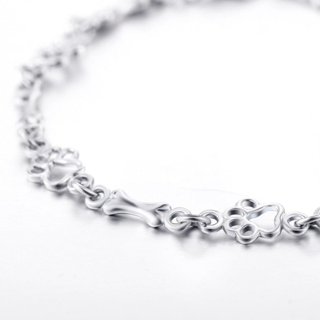 Armband mit Hundepfoten- und Knochen-Anhängern in Weißgold – Ansicht 3
