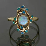 Blauer Retro-Ring mit Kristallen und Opal
