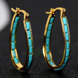 Ohrringe Caspienne in Gold