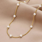 Halskette mit Naturperle in Gold