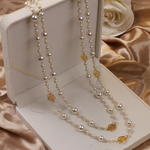 Elegante Halskette mit kleiner Perle in Gold