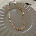 Elegante Halskette in Gold und Weißgold