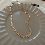 Elegante Halskette in Gold und Weißgold