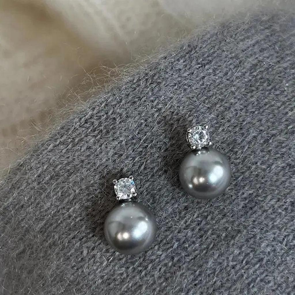 Elegante Ohrringe mit schwarzer Perle und Zirkonia