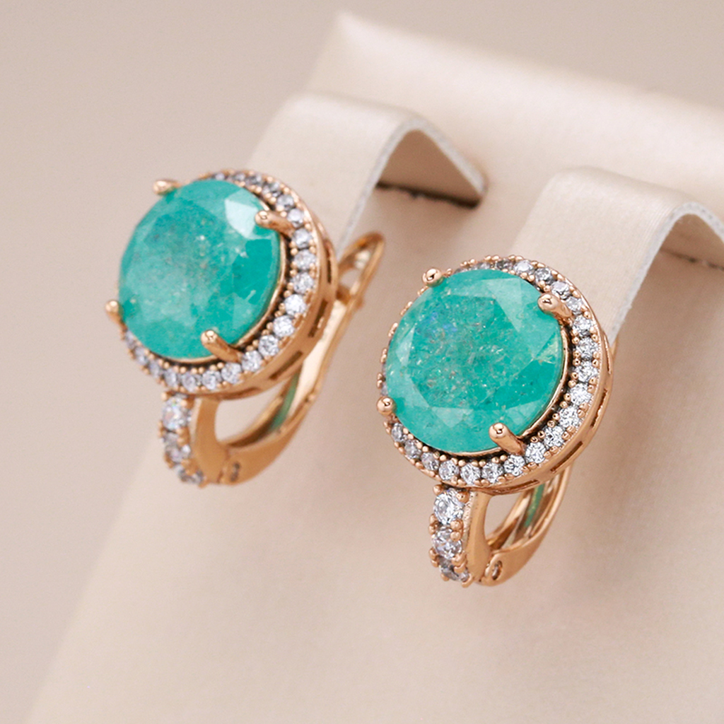Elegante Ohrringe in Gold mit Türkis und Opal