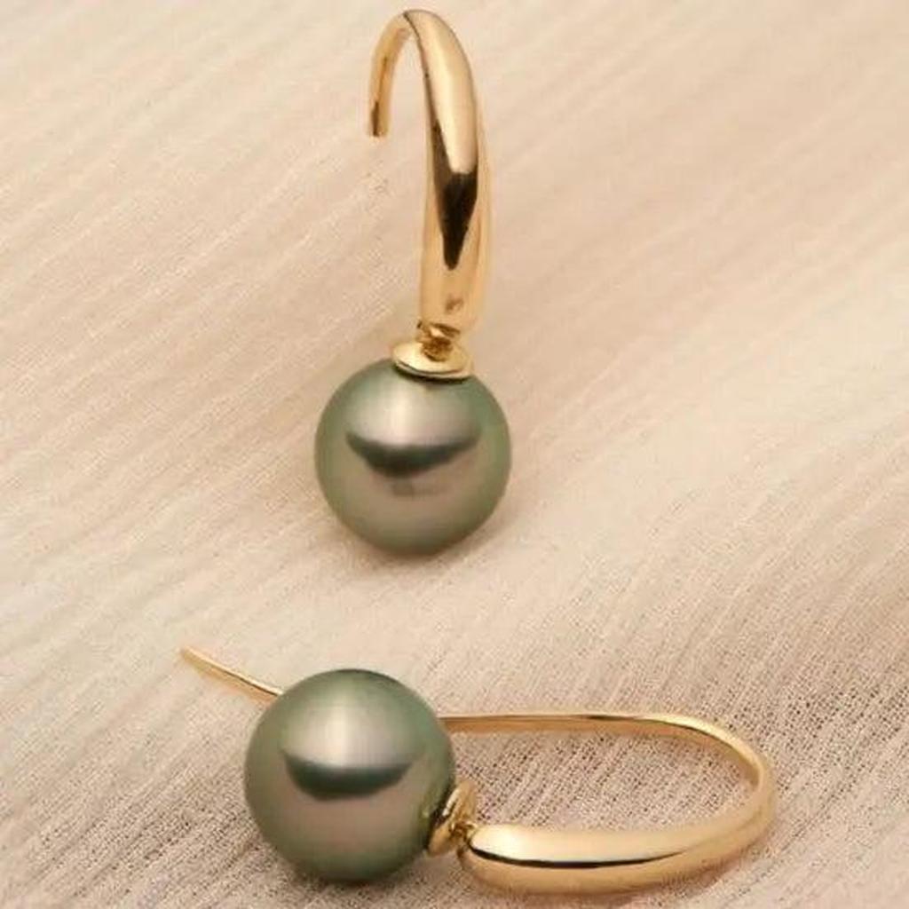 Elegante Ohrringe mit olivenförmigen Perlen