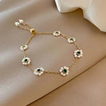 Elegantes Armband mit grünen Kristallen