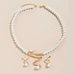 Geschenkset mit Naturperlen: Halskette und Ohrringe in Gold, Ansicht 6