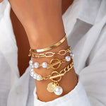 Armband-Set mit Schlange, Perlen und Gliedern in Gold