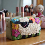 Gesteppte Kosmetiktasche mit Blumenmotiv