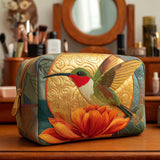 Gesteppte Kosmetiktasche mit goldenem Muster