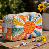 Gesteppte Kosmetiktasche mit goldenem Strahl