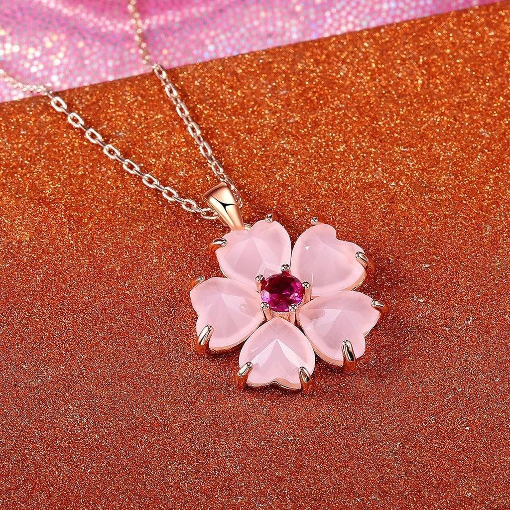 Halskette mit Blume in Gold und Rosa