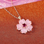 Halskette mit Blume in Gold und Rosa