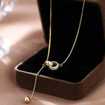 Halskette mit zwei Ringen