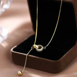 Halskette mit zwei Ringen
