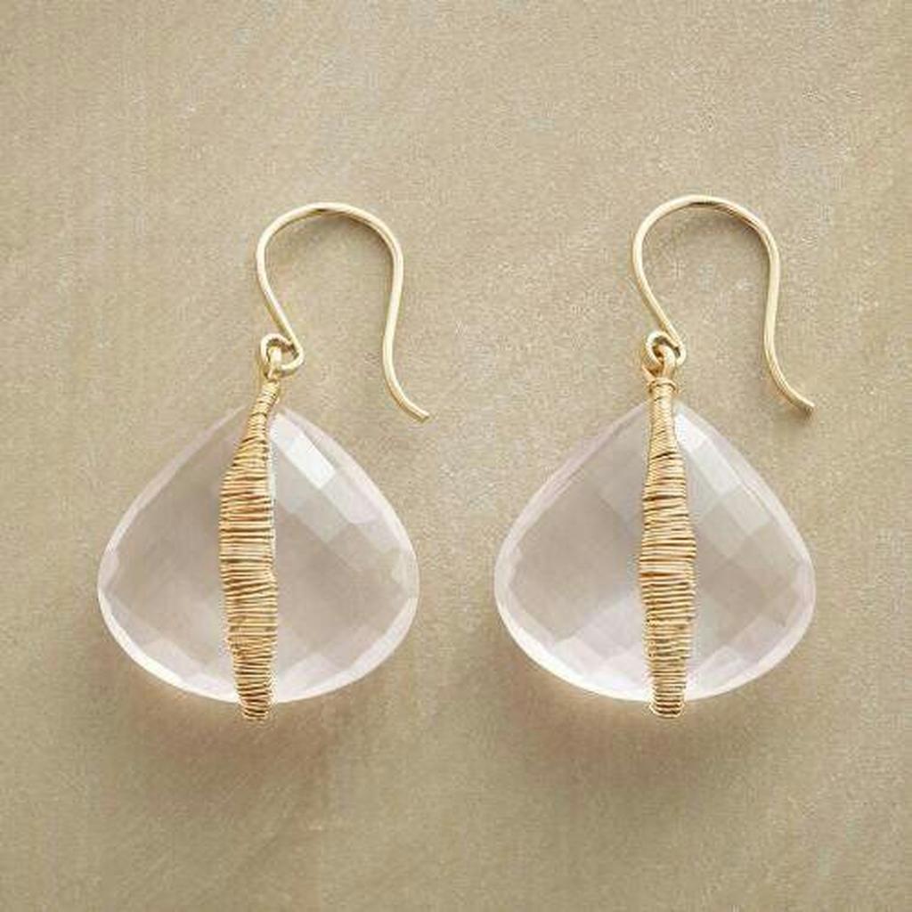 Ohrringe in Gold mit weißem Kristall