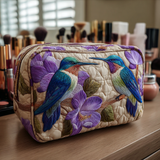 Gesteppte Kosmetiktasche mit zartem Kolibri