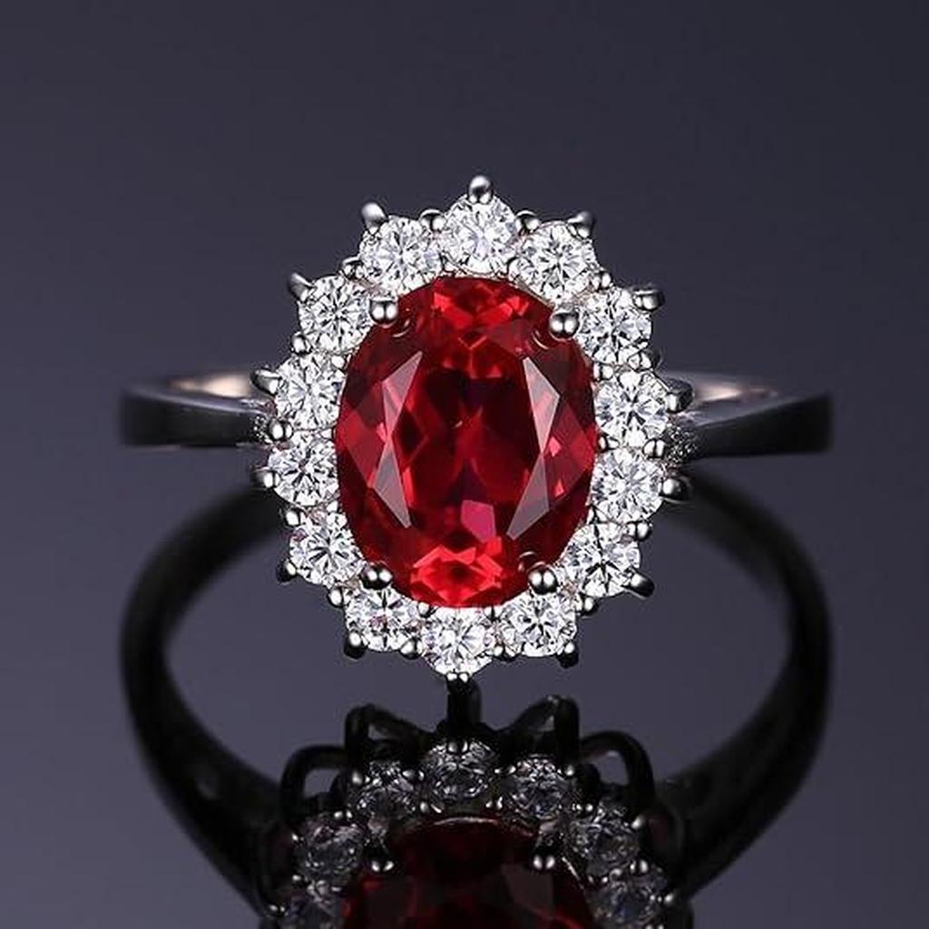 Klassischer Ring mit Rubin und Weißgold-Rand
