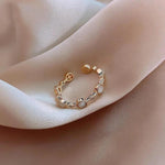 Klassischer verstellbarer Ring in Gold mit Kristall