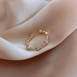 Klassischer verstellbarer Ring in Gold mit Kristall