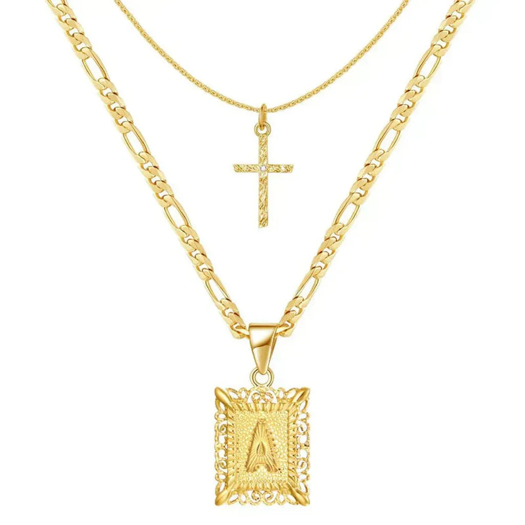 Kreuzkette mit Initiale in Gold