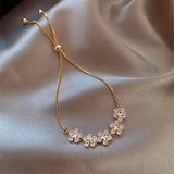 Margeritenarmband mit Kristall in Gold – Ansicht 3
