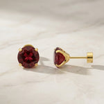 Runde Rubin-Ohrringe in Gold