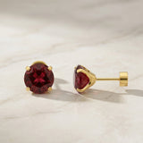 Runde Rubin-Ohrringe in Gold