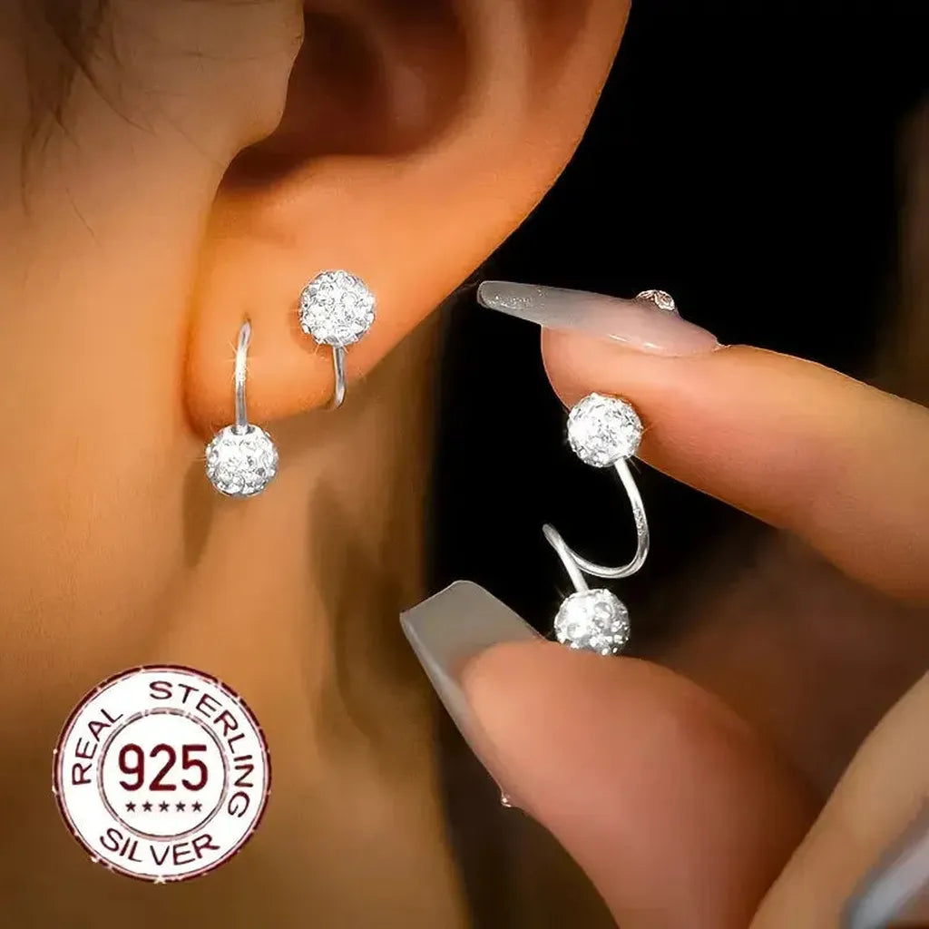 Ohrringe mit doppelter Spirale und Zirkonia