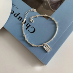 Quadratisches Weißgold-Armband „Liebe“ – Ansicht 2