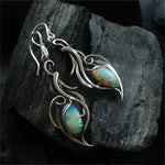 Retro-Ohrringe in Weißgold mit blauem Opal