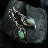 Retro-Ohrringe in Weißgold mit blauem Opal