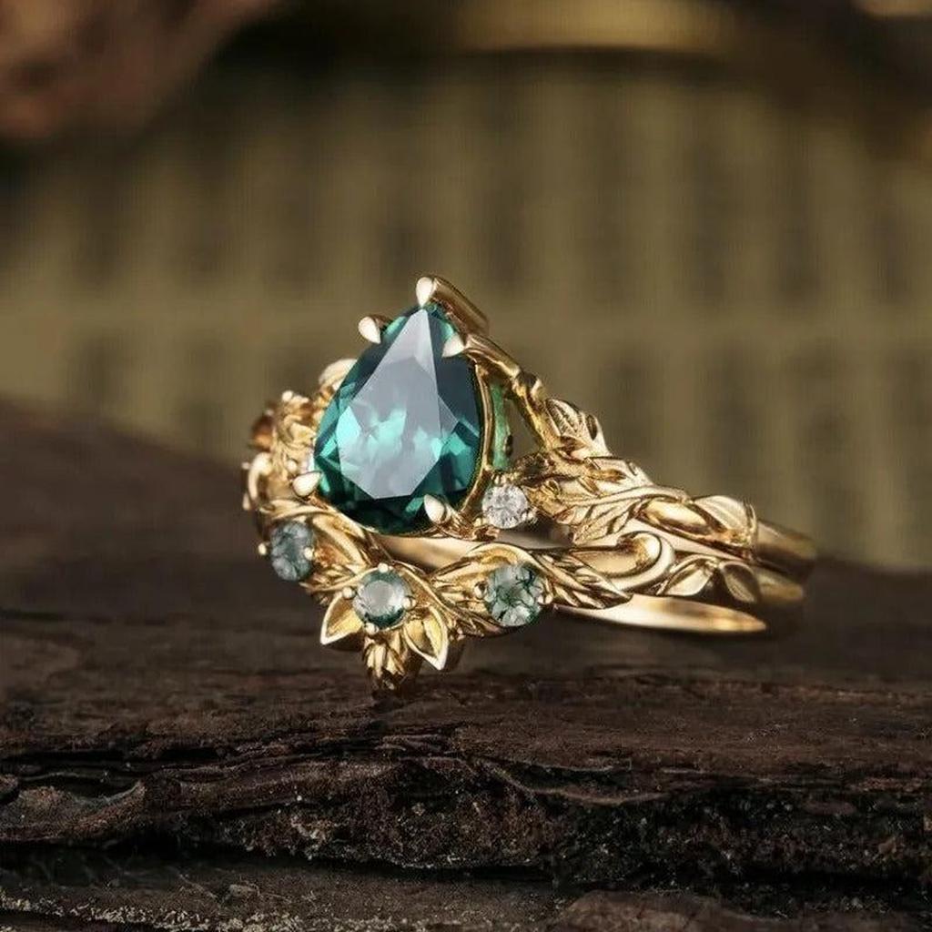 Retro-Ring mit grünem Blumenstein