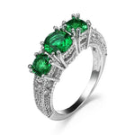 Ring mit 3 smaragdgrünen Steinen