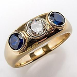Ring mit Zirkonia und blauem Kristall