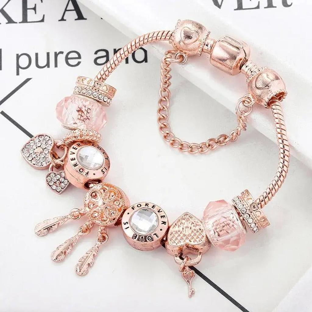 Rosa Traumfänger-Armband mit Weißgold-Anhängern
