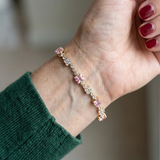 Tennisarmband mit Rosé-Quadraten in Gold
