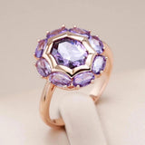 Runder Ring mit lila Kristall