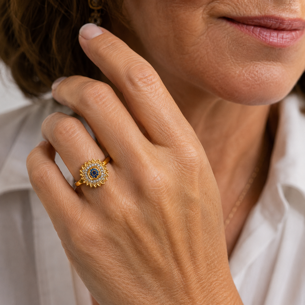 Saphir-Drehring „Sonnenstrahlen“ in Gold