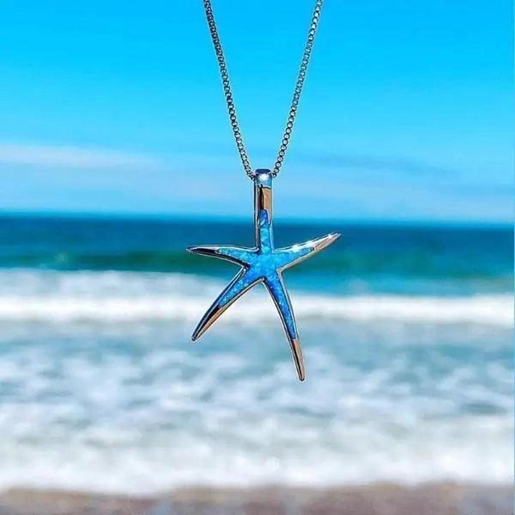 Sternanhänger mit blauem Opal in Weißgold