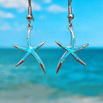Sternohrringe mit Opal in Weißgold