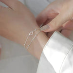 Verstellbares Weißgold-Armband mit Herz