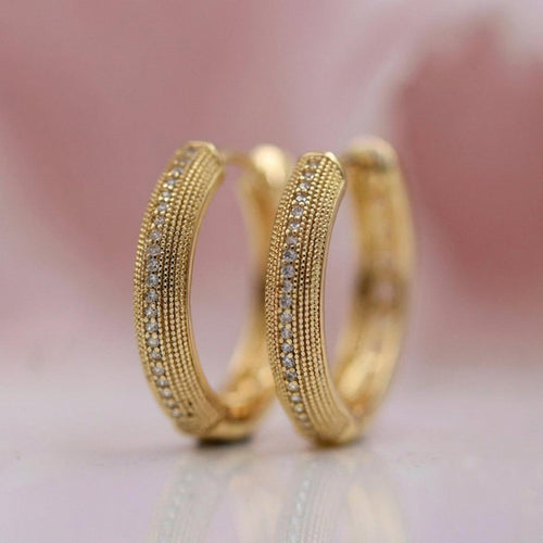 Vintage-Ohrringe in Gold mit elegantem Design