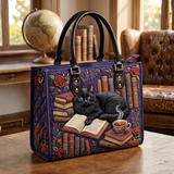 Stepptasche Buch & schwarze Katze Lila – gesteppte Henkeltasche für Damen