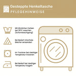 Stepptasche Weiße Magnolien – gesteppte Henkeltasche für Damen